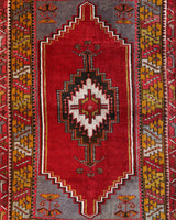 Vintage Turkish rug in a living room setting, pile rug, Turkish rug, vintage rug, portland, rug shop, bright colors, wild shaman, soft rug, bold color, Portland, Oregon, rug store, rug shop, local shop, antique rug