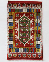 Vintage Turkish rug in a living room setting, pile rug, Turkish rug, vintage rug, portland, rug shop, bright colors, wild shaman, soft rug, bold color, Portland, Oregon, rug store, rug shop, local shop, antique rug