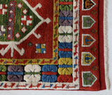Vintage Turkish rug in a living room setting, pile rug, Turkish rug, vintage rug, portland, rug shop, bright colors, wild shaman, soft rug, bold color, Portland, Oregon, rug store, rug shop, local shop, antique rug