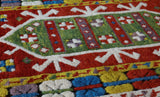 Vintage Turkish rug in a living room setting, pile rug, Turkish rug, vintage rug, portland, rug shop, bright colors, wild shaman, soft rug, bold color, Portland, Oregon, rug store, rug shop, local shop, antique rug