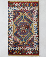 Vintage Turkish rug in a living room setting, pile rug, Turkish rug, vintage rug, portland, rug shop, bright colors, wild shaman, soft rug, bold color, Portland, Oregon, rug store, rug shop, local shop, antique rug