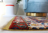 Vintage Turkish rug in a living room setting, pile rug, Turkish rug, vintage rug, portland, rug shop, bright colors, wild shaman, soft rug, bold color, Portland, Oregon, rug store, rug shop, local shop, antique rug