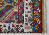 Vintage Turkish rug in a living room setting, pile rug, Turkish rug, vintage rug, portland, rug shop, bright colors, wild shaman, soft rug, bold color, Portland, Oregon, rug store, rug shop, local shop, antique rug