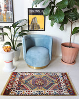 Vintage Turkish rug in a living room setting, pile rug, Turkish rug, vintage rug, portland, rug shop, bright colors, wild shaman, soft rug, bold color, Portland, Oregon, rug store, rug shop, local shop, antique rug
