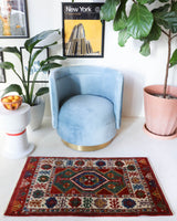 Vintage Turkish rug in a living room setting, pile rug, Turkish rug, vintage rug, portland, rug shop, bright colors, wild shaman, soft rug, bold color, Portland, Oregon, rug store, rug shop, local shop, antique rug