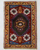 Vintage Turkish rug in a living room setting, pile rug, Turkish rug, vintage rug, portland, rug shop, bright colors, wild shaman, soft rug, bold color, Portland, Oregon, rug store, rug shop, local shop, antique rug