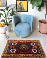 Vintage Turkish rug in a living room setting, pile rug, Turkish rug, vintage rug, portland, rug shop, bright colors, wild shaman, soft rug, bold color, Portland, Oregon, rug store, rug shop, local shop, antique rug