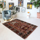 Vintage Turkish rug in a living room setting, pile rug, Turkish rug, vintage rug, portland, rug shop, bright colors, wild shaman, soft rug, bold color, Portland, Oregon, rug store, rug shop, local shop, antique rug