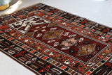 Vintage Turkish rug in a living room setting, pile rug, Turkish rug, vintage rug, portland, rug shop, bright colors, wild shaman, soft rug, bold color, Portland, Oregon, rug store, rug shop, local shop, antique rug