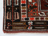 Vintage Turkish rug in a living room setting, pile rug, Turkish rug, vintage rug, portland, rug shop, bright colors, wild shaman, soft rug, bold color, Portland, Oregon, rug store, rug shop, local shop, antique rug