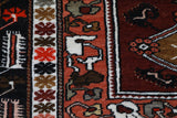 Vintage Turkish rug in a living room setting, pile rug, Turkish rug, vintage rug, portland, rug shop, bright colors, wild shaman, soft rug, bold color, Portland, Oregon, rug store, rug shop, local shop, antique rug