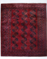 Antique Turkmen rug in a living room setting, pile rug, Turkish rug, vintage rug, portland, rug shop, bright colors, wild shaman, soft rug, bold color, Portland, Oregon, rug store, rug shop, local shop, antique rug
