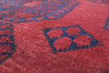 Antique Turkmen rug in a living room setting, pile rug, Turkish rug, vintage rug, portland, rug shop, bright colors, wild shaman, soft rug, bold color, Portland, Oregon, rug store, rug shop, local shop, antique rug