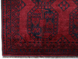 Antique Turkmen rug in a living room setting, pile rug, Turkish rug, vintage rug, portland, rug shop, bright colors, wild shaman, soft rug, bold color, Portland, Oregon, rug store, rug shop, local shop, antique rug