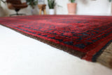 Antique Turkmen rug in a living room setting, pile rug, Turkish rug, vintage rug, portland, rug shop, bright colors, wild shaman, soft rug, bold color, Portland, Oregon, rug store, rug shop, local shop, antique rug