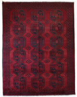 Antique Turkmen rug in a living room setting, pile rug, Turkish rug, vintage rug, portland, rug shop, bright colors, wild shaman, soft rug, bold color, Portland, Oregon, rug store, rug shop, local shop, antique rug