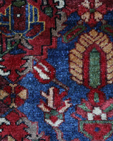 Antique Persian area rug in a living room setting, pile rug, vintage rug, portland, rug shop, bright colors, wild shaman, soft rug, bold color, Portland, Oregon, rug store, rug shop, local shop, antique rug, Persian rug, handmade rug, wool rug, distressed rug