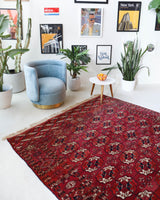 Antique Turkmen rug in a living room setting, pile rug, Turkish rug, vintage rug, portland, rug shop, bright colors, wild shaman, soft rug, bold color, Portland, Oregon, rug store, rug shop, local shop, antique rug