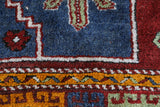 Vintage Turkish rug in a living room setting, Area rug in a living room setting, pile rug, Turkish rug, custom rug, modern rug, portland, rug shop, bright colors, wild shaman, soft rug, bold color, Portland, Oregon, rug store, rug shop, local shop