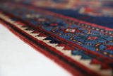 Vintage Turkish rug in a living room setting, Area rug in a living room setting, pile rug, Turkish rug, custom rug, modern rug, portland, rug shop, bright colors, wild shaman, soft rug, bold color, Portland, Oregon, rug store, rug shop, local shop