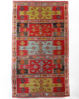 Vintage kilim rug in living room setting, bright colors, wild shaman, soft rug, bold color, Portland, Oregon, rug store, rug shop, local shop, vintage rug, modern kilim, warm colors