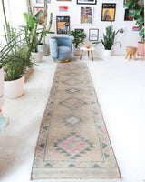 Vintage Turkish runner rug in living room setting, old rug, antique rug, pastel colors, faded colors, Turkish rug, vintage rug, soft rug, Portland, Oregon, rug store, rug shop, local shop