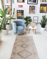 Vintage Turkish runner rug in living room setting, old rug, antique rug, pastel colors, faded colors, Turkish rug, vintage rug, soft rug, Portland, Oregon, rug store, rug shop, local shop