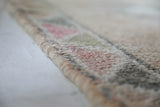 Vintage Turkish runner rug in living room setting, old rug, antique rug, pastel colors, faded colors, Turkish rug, vintage rug, soft rug, Portland, Oregon, rug store, rug shop, local shop