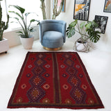 Vintage kilim rug in room decor setting, old rug, antique rug, pastel colors, faded colors, Turkish rug, vintage rug, soft rug, Portland, Oregon, rug store, rug shop, local shop, bold colors, bright colors, faded colors