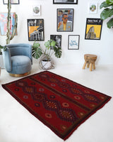 Vintage kilim rug in room decor setting, old rug, antique rug, pastel colors, faded colors, Turkish rug, vintage rug, soft rug, Portland, Oregon, rug store, rug shop, local shop, bold colors, bright colors, faded colors