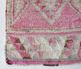 Vintage Turkish runner rug in living room setting, old rug, antique rug, pastel colors, faded colors, Turkish rug, vintage rug, soft rug, Portland, Oregon, rug store, rug shop, local shop