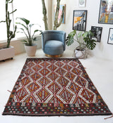 Vintage kilim rug in living room setting, bright colors, wild shaman, soft rug, bold color, Portland, Oregon, rug store, rug shop, local shop, vintage rug, modern kilim, warm colors