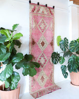 Vintage Turkish runner rug in living room setting, old rug, antique rug, pastel colors, faded colors, Turkish rug, vintage rug, soft rug, Portland, Oregon, rug store, rug shop, local shop