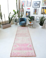 Vintage Turkish runner rug in living room setting, old rug, antique rug, pastel colors, faded colors, Turkish rug, vintage rug, soft rug, Portland, Oregon, rug store, rug shop, local shop