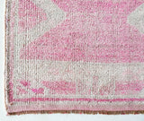 Vintage Turkish runner rug in living room setting, old rug, antique rug, pastel colors, faded colors, Turkish rug, vintage rug, soft rug, Portland, Oregon, rug store, rug shop, local shop