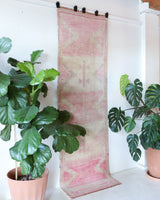 Vintage Turkish runner rug in living room setting, old rug, antique rug, pastel colors, faded colors, Turkish rug, vintage rug, soft rug, Portland, Oregon, rug store, rug shop, local shop