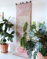 Vintage Turkish runner rug in living room setting, old rug, antique rug, pastel colors, faded colors, Turkish rug, vintage rug, soft rug, Portland, Oregon, rug store, rug shop, local shop