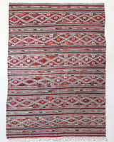 Vintage kilim rug in living room setting, bright colors, wild shaman, soft rug, bold color, Portland, Oregon, rug store, rug shop, local shop, vintage rug, modern kilim, warm colors