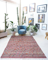 Vintage kilim rug in living room setting, bright colors, wild shaman, soft rug, bold color, Portland, Oregon, rug store, rug shop, local shop, vintage rug, modern kilim, warm colors
