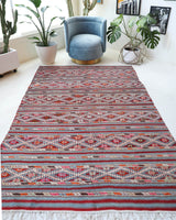 Vintage kilim rug in living room setting, bright colors, wild shaman, soft rug, bold color, Portland, Oregon, rug store, rug shop, local shop, vintage rug, modern kilim, warm colors
