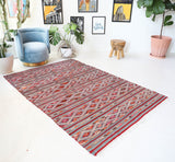 Vintage kilim rug in living room setting, bright colors, wild shaman, soft rug, bold color, Portland, Oregon, rug store, rug shop, local shop, vintage rug, modern kilim, warm colors