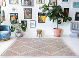 Vintage kilim rug in living room setting, old rug, antique rug, pastel colors, faded colors, Turkish rug, vintage rug, soft rug, Portland, Oregon, rug store, rug shop, local shop, earthy tones, earthy colors, warm colors