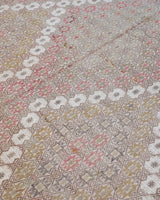 Vintage kilim rug in living room setting, old rug, antique rug, pastel colors, faded colors, Turkish rug, vintage rug, soft rug, Portland, Oregon, rug store, rug shop, local shop, earthy tones, earthy colors, warm colors