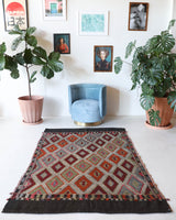 Vintage kilim rug in living room setting, bright colors, wild shaman, soft rug, bold color, Portland, Oregon, rug store, rug shop, local shop, vintage rug, modern kilim, warm colors