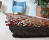 Vintage kilim rug in living room setting, bright colors, wild shaman, soft rug, bold color, Portland, Oregon, rug store, rug shop, local shop, vintage rug, modern kilim, warm colors