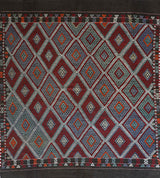 Vintage kilim rug in living room setting, bright colors, wild shaman, soft rug, bold color, Portland, Oregon, rug store, rug shop, local shop, vintage rug, modern kilim, warm colors