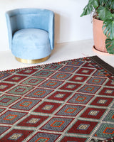 Vintage kilim rug in living room setting, bright colors, wild shaman, soft rug, bold color, Portland, Oregon, rug store, rug shop, local shop, vintage rug, modern kilim, warm colors