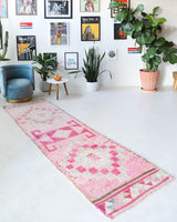 Vintage Turkish runner rug in living room setting, old rug, antique rug, pastel colors, faded colors, Turkish rug, vintage rug, soft rug, Portland, Oregon, rug store, rug shop, local shop