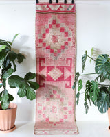 Vintage Turkish runner rug in living room setting, old rug, antique rug, pastel colors, faded colors, Turkish rug, vintage rug, soft rug, Portland, Oregon, rug store, rug shop, local shop