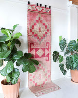 Vintage Turkish runner rug in living room setting, old rug, antique rug, pastel colors, faded colors, Turkish rug, vintage rug, soft rug, Portland, Oregon, rug store, rug shop, local shop